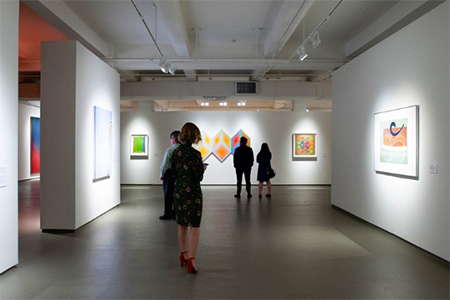 people viewing an exhibition