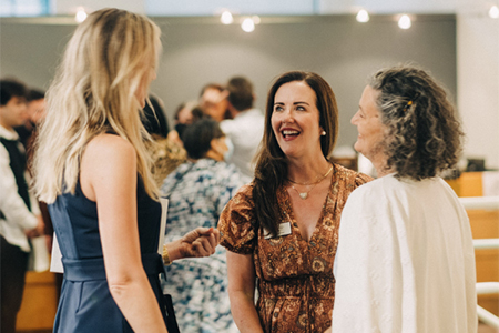 three women talking at MOCA