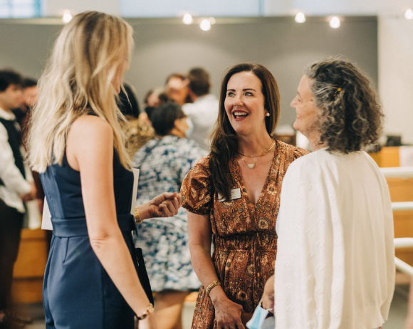 a group of women chatting