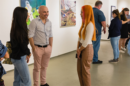 groups of people in an exhibit