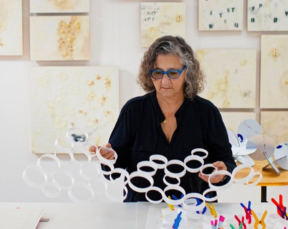 sheila goloborotko working in an art studio