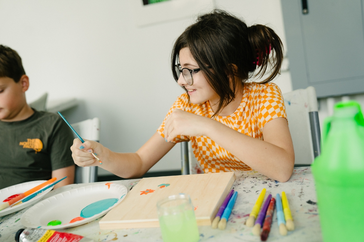 A student painting during Summer Camp @ MOCA