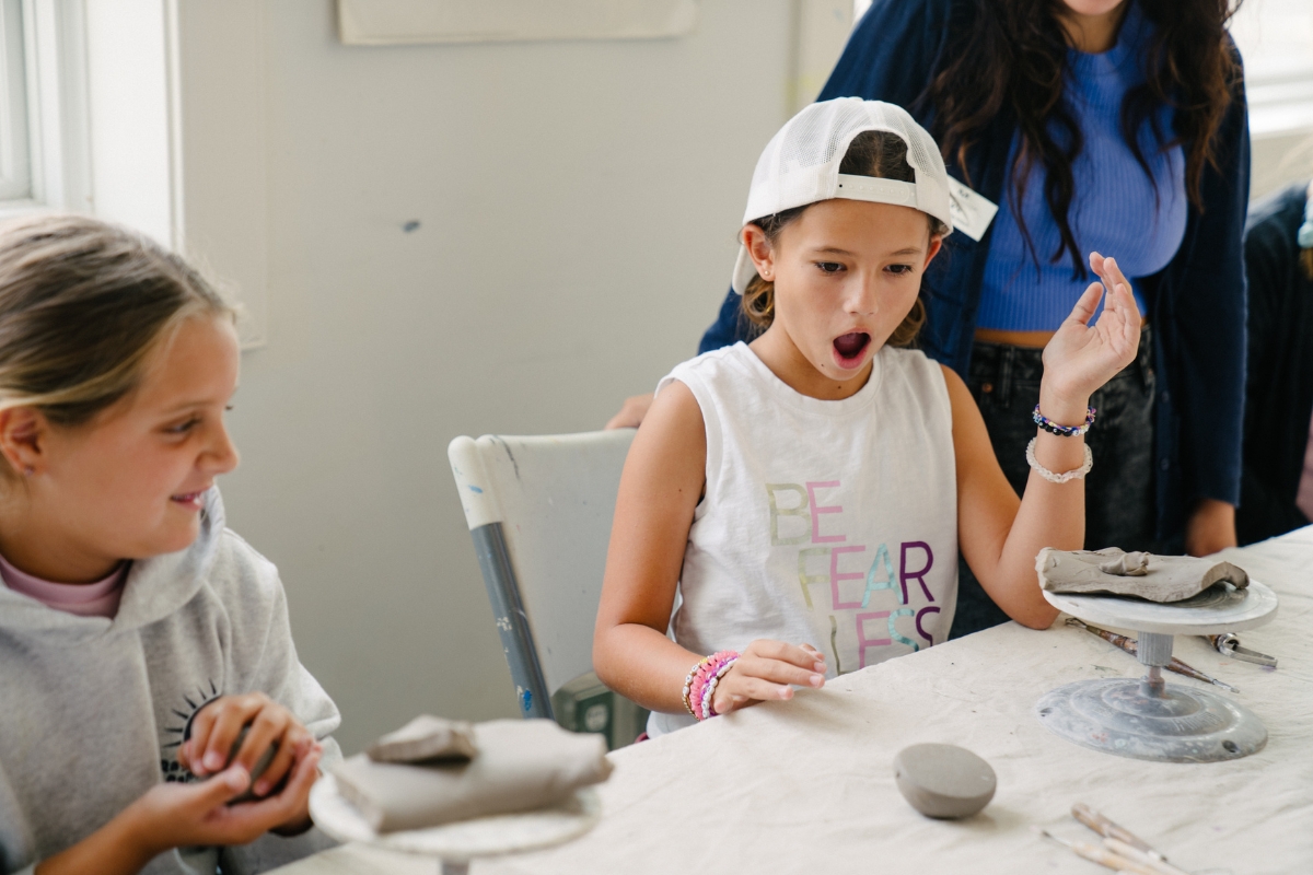 A student making ceramics during Summer Camp @ MOCA