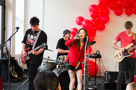 band performing at Night in Red