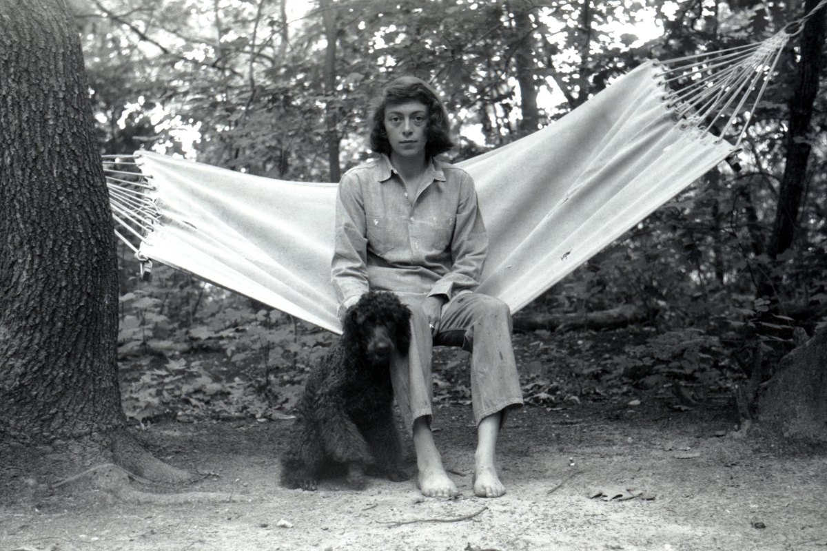 Joan Mitchell with her poodle, Georges du Soleil, in Springs, New York, ca. 1953. 